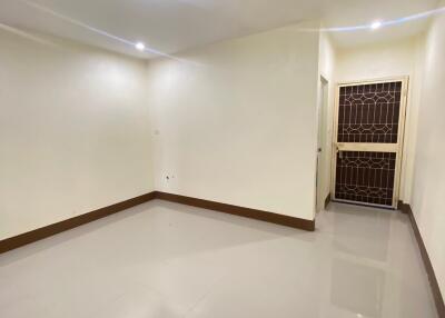 main living area with bright lighting and clean floors