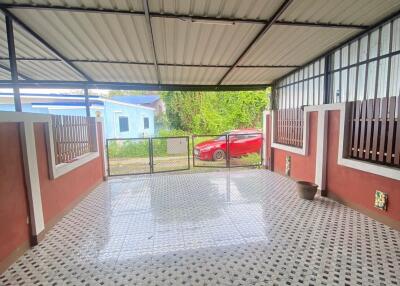 covered patio with tiled flooring