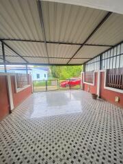 covered patio with tiled flooring