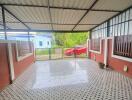 covered patio with tiled flooring