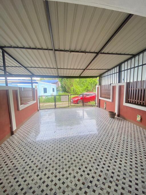 covered patio with tiled flooring