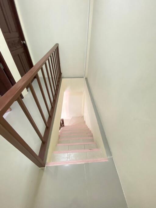 Indoor Staircase with Wooden Railing