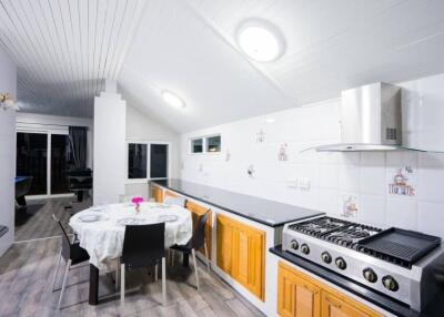 Bright modern kitchen with dining area