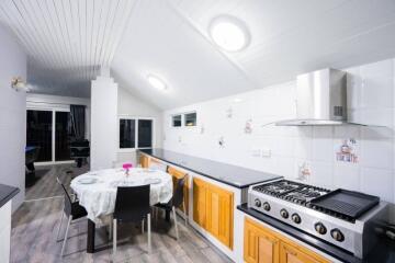 Bright modern kitchen with dining area