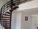 Living area with open staircase and upper loft