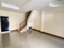 Modern empty living room with staircase