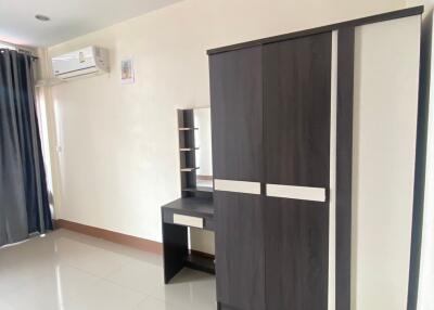 Bedroom with wardrobe and dressing table