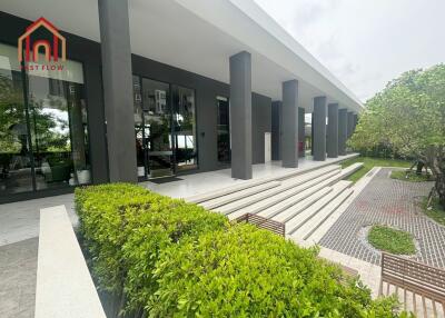 Outdoor area with modern building and greenery