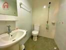 Bathroom with white tiles and essential fixtures