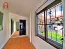 Bright hallway with decorative window grills