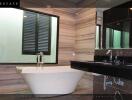 Modern bathroom with bathtub and dual sink vanity