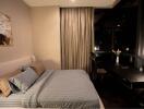 Cozy bedroom with night view and modern furnishings