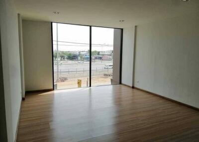 Spacious and bright living room with large window