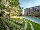 Lush green garden area with pool