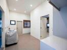 Laundry room with ample space and modern fixtures