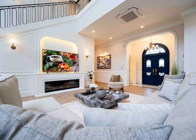 Spacious and elegantly decorated living room with modern amenities