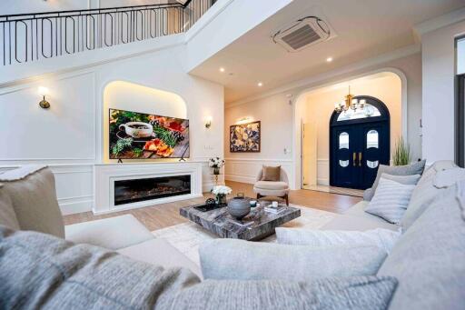 Spacious and elegantly decorated living room with modern amenities