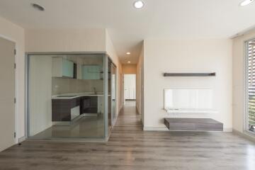 Minimalist main living space with open kitchen