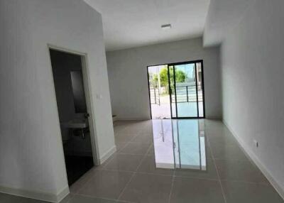 Spacious main living area with large sliding glass doors