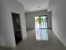 Spacious main living area with large sliding glass doors