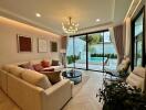 Cozy living room with large glass doors leading to a pool area