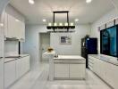 Modern kitchen with white cabinets and island