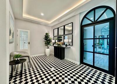 Stylish Modern Hallway with Checkerboard Floor Tiles