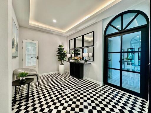 Stylish Modern Hallway with Checkerboard Floor Tiles