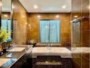 Modern bathroom with a bathtub and dark tiled walls