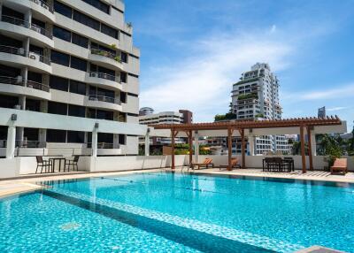 Outdoor swimming pool in a residential complex