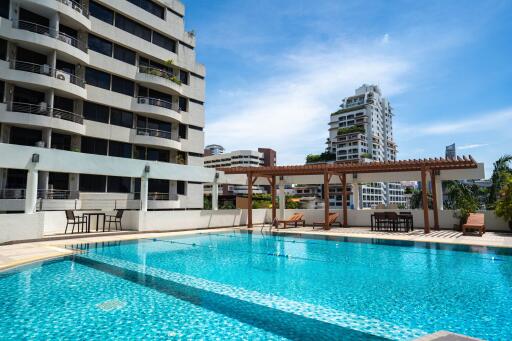 Outdoor swimming pool in a residential complex