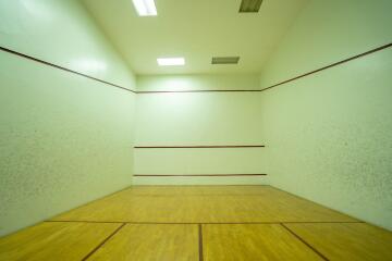 Squash court with wooden flooring