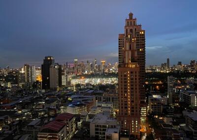 Night view of a city with tall buildings