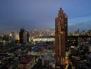 Night view of a city with tall buildings