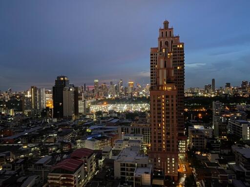 Night view of a city with tall buildings