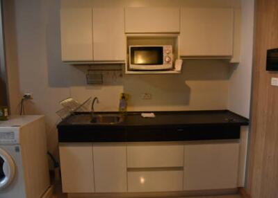 Modern kitchen with appliances and cabinetry