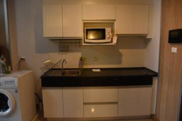 Modern kitchen with appliances and cabinetry