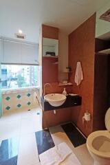 Modern bathroom with large window