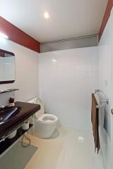 Modern bathroom with a sleek sink and toilet