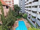 View of apartment buildings with swimming pool