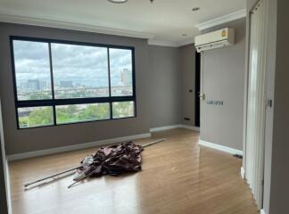 empty bedroom with large window