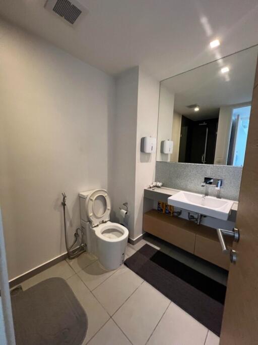 modern bathroom with vanity and toilet