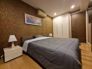 Modern bedroom with double bed and stylish decor