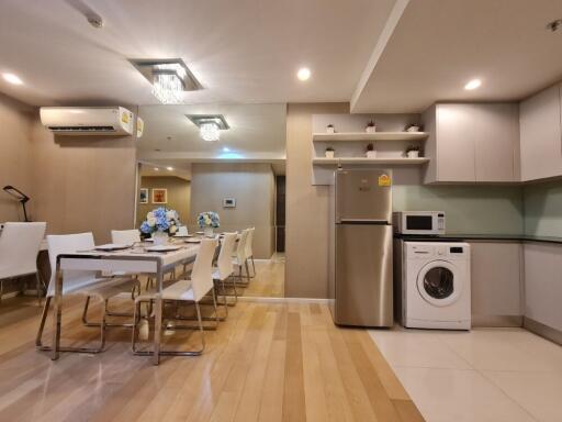 Modern dining area with integrated kitchen