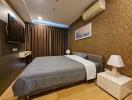 Modern bedroom with a double bed, air conditioning, and contemporary decor