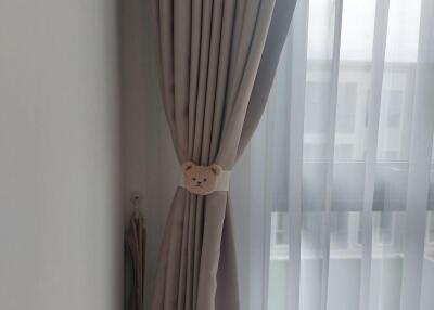 Curtains in a bright bedroom