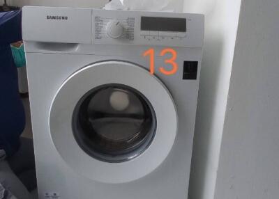 Washing machine in a laundry area