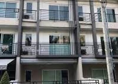 Front exterior view of modern multi-level townhouse