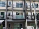 Front exterior view of modern multi-level townhouse