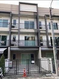 Front exterior view of modern multi-level townhouse